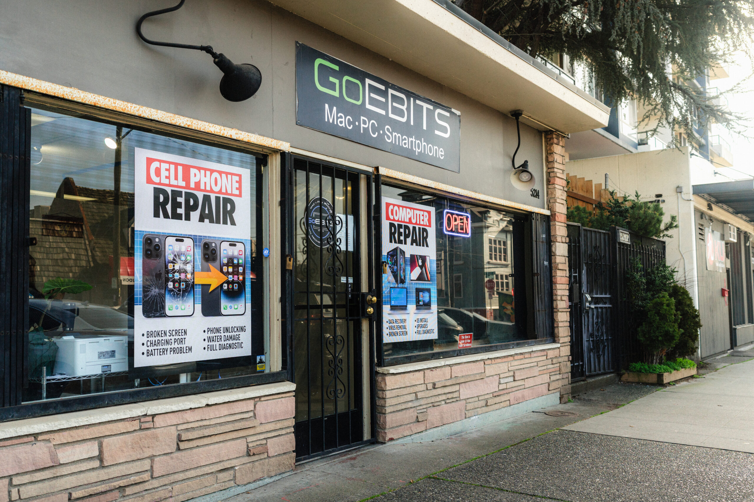goebits retail storefront facade and sign that reads cell phone repair and copmuter repair in seattle
