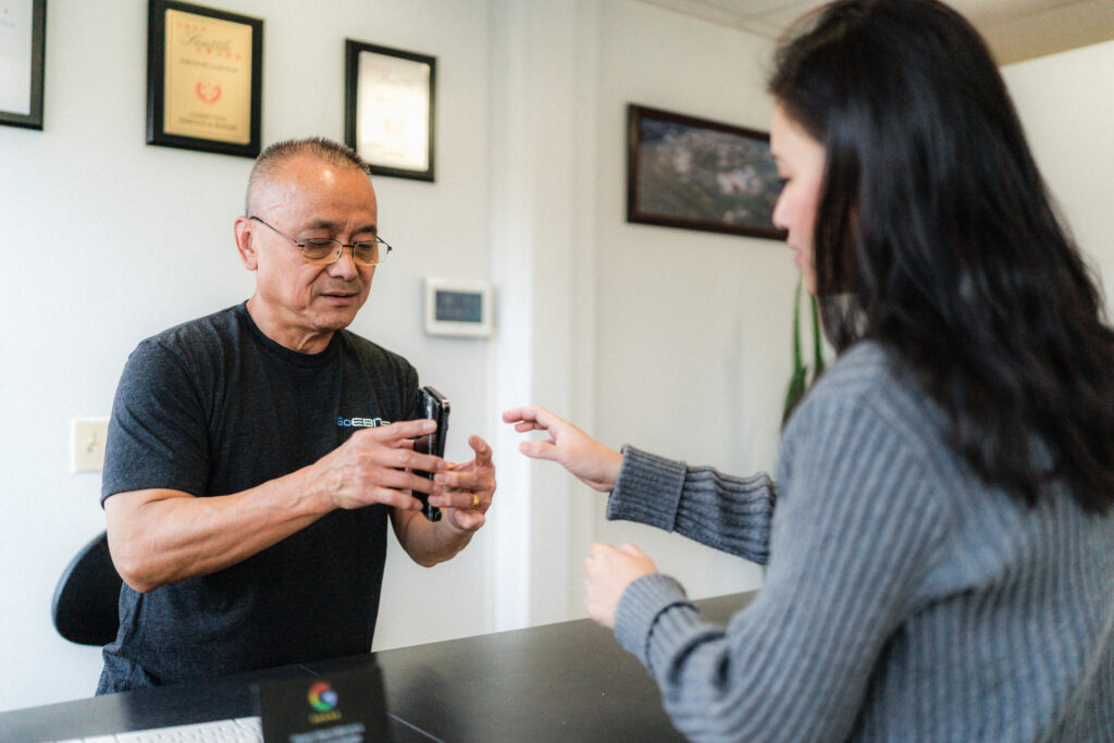 customer service interaction iphone smart phone repair intake in north seattle