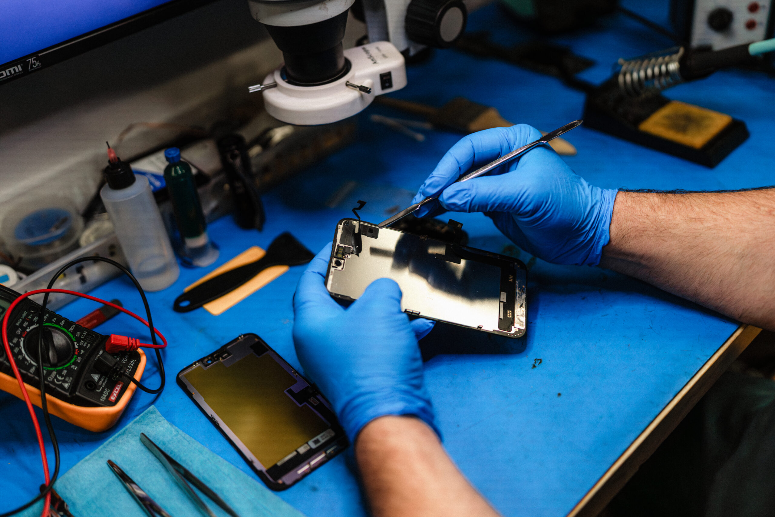 apple iphone repair by certified technician replacing battery and screen
