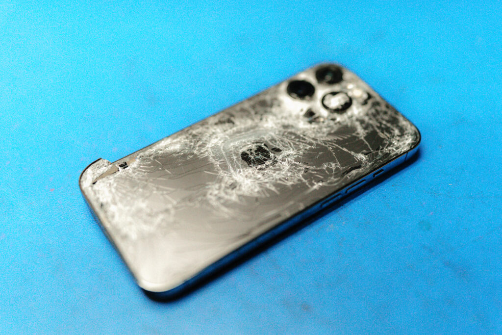 broken apple iphone in repair for screen replacement and back casing